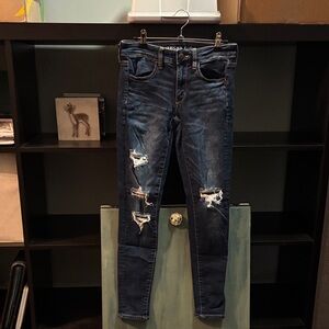 Women's Distressed Blue Jeans - next level stretch